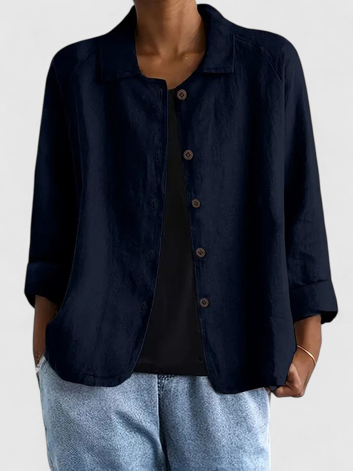 Chic women's long-sleeve top, sophisticated & versatile for elegant casual wear.