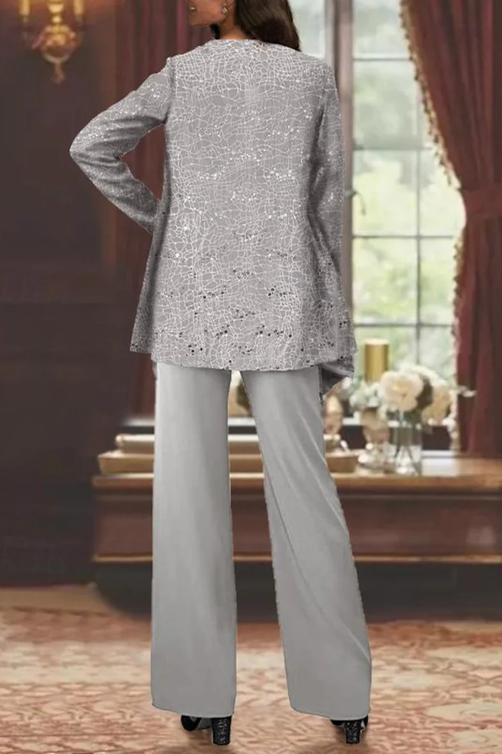 Matching women's sequin pant suit with wide-leg pants and a sophisticated three-piece design.