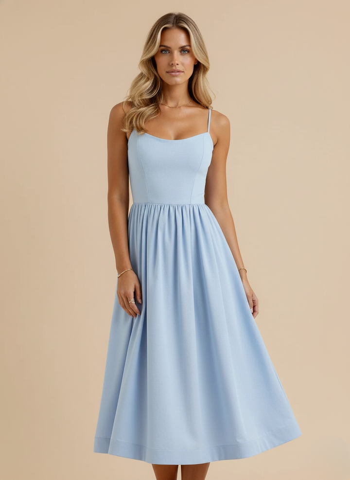 Lightweight women's spaghetti strap midi dress. Scoop neck, fit & flare for comfortable summer fashion.
