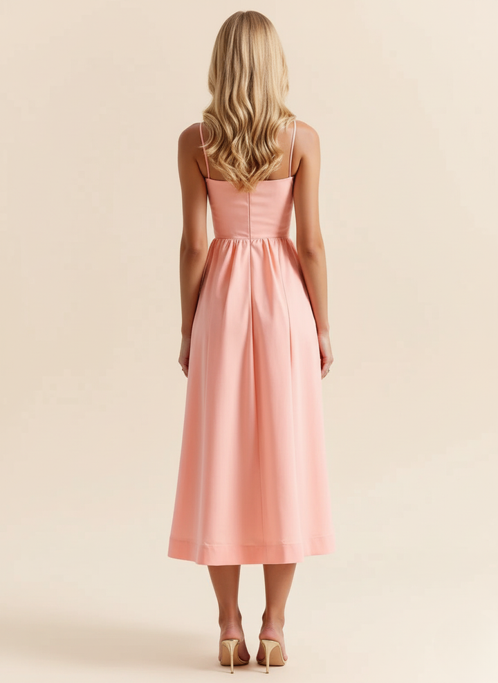 Women's spaghetti strap scoop neck fit & flare midi dress for summer and casual occasions.