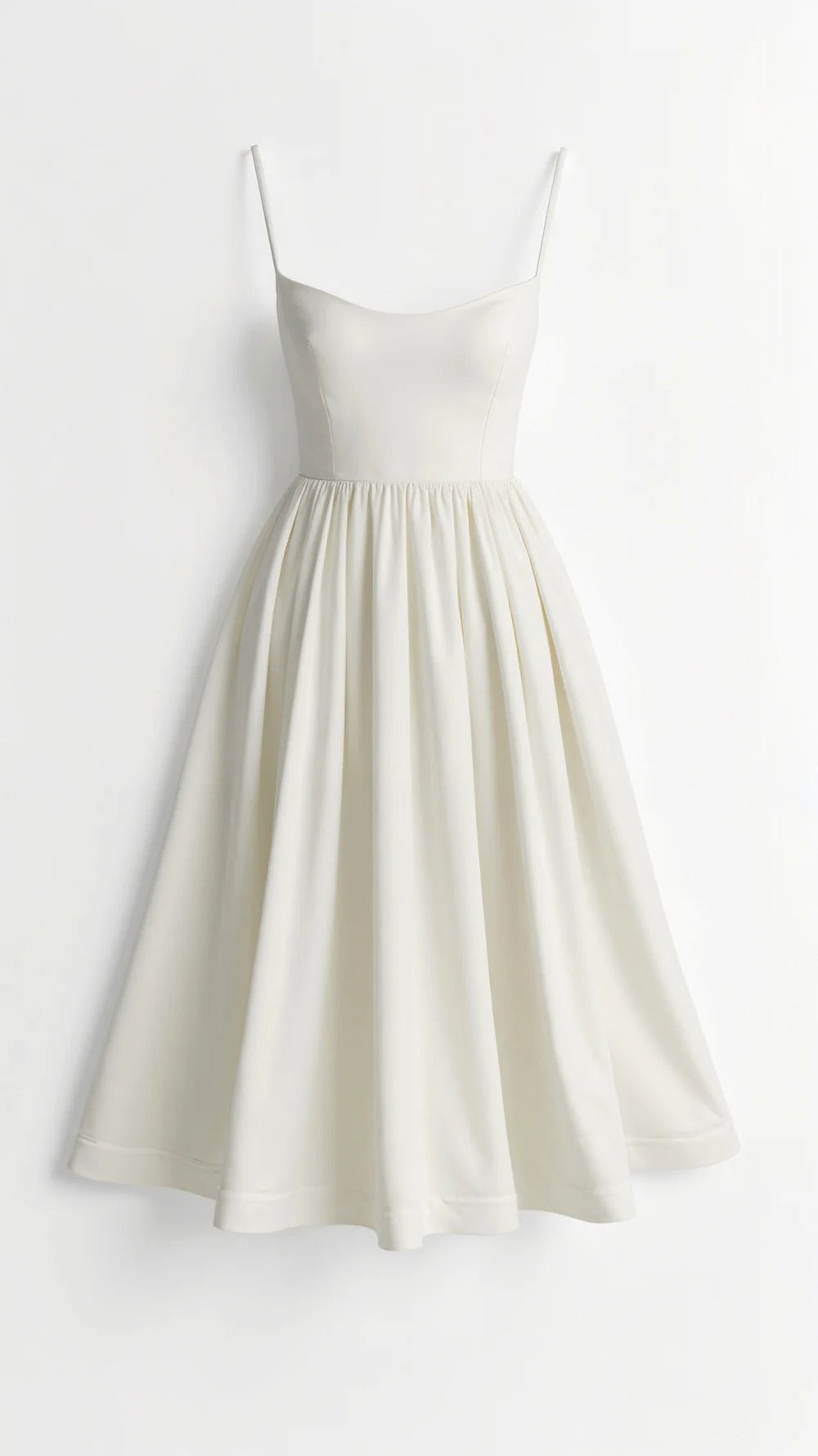 Flattering women's fit & flare midi dress featuring spaghetti straps, a scoop neck, and a feminine silhouette.