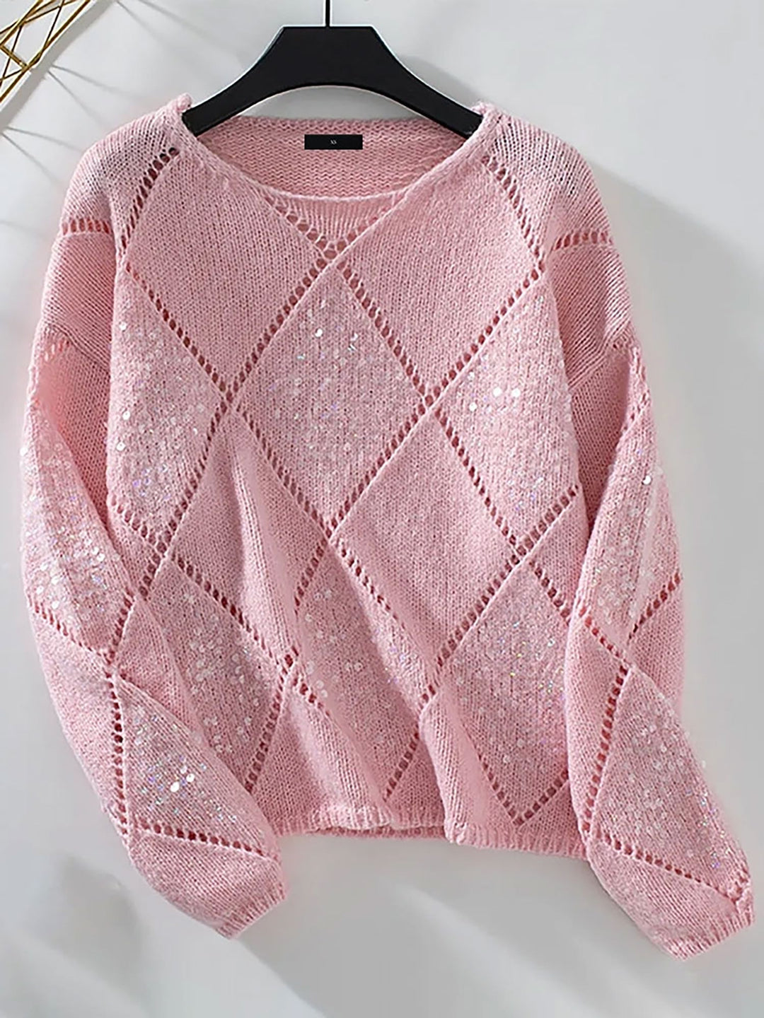 Stylish women's glitter crew neck sweater, featuring a sparkling diamond pattern for any event.