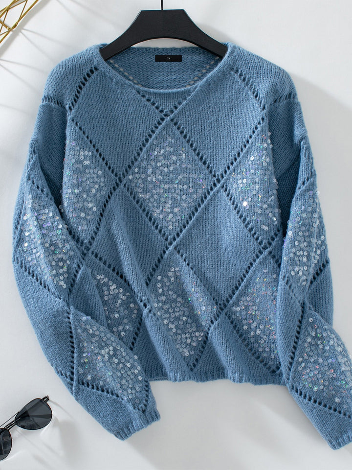 Stylish & comfortable women's diamond pattern crew neck sweater, featuring sparkling details.