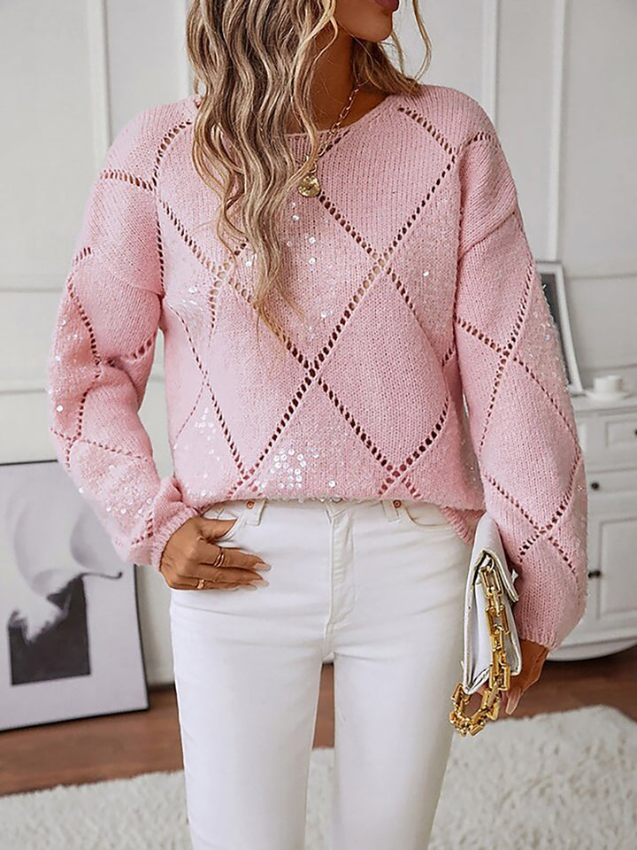Relaxed fit women's glitter sweater, showcasing a sparkling diamond pattern and classic crew neck.