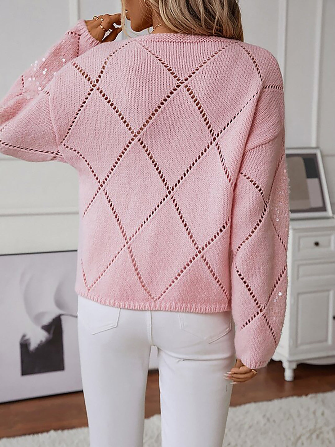 Women's sparkle top: a dazzling crew neck sweater with diamond pattern, perfect for party wear.