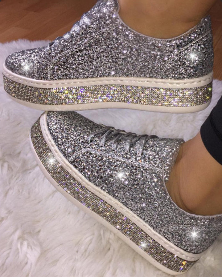 Women's sparkling glitter platform sneakers. Trendy casual footwear for chic, comfortable everyday style.