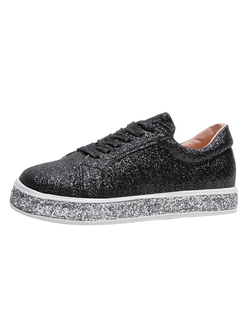 Elevated platform glitter sneakers for women. Trendy ladies shoes offering chic style and comfortable everyday wear.