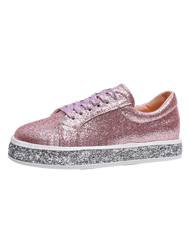 Chic women's platform glitter sneakers. Fashionable, comfortable casual footwear for ladies, perfect for trendy style.