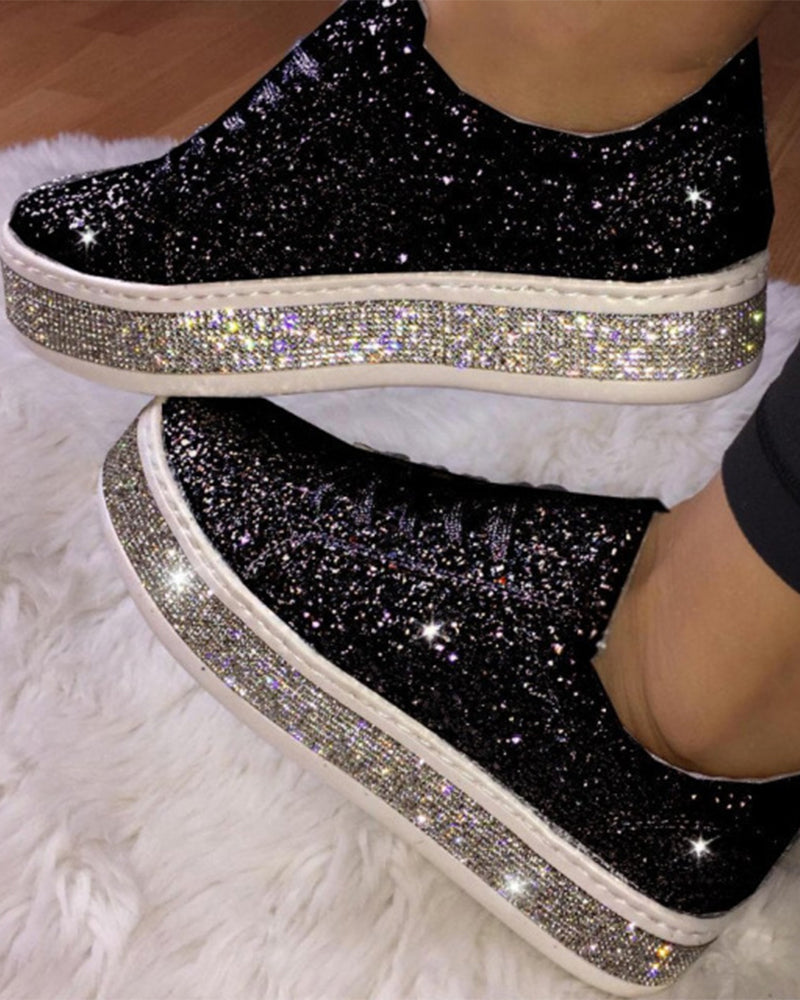 Silver glitter platform sneakers for women. Fashionable, comfortable ladies shoes, perfect for casual everyday wear.