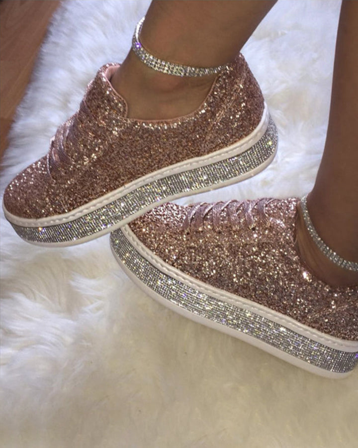 Pink glitter platform ladies sneakers. Trendy and comfortable fashion shoes, ideal for casual, effortless style.