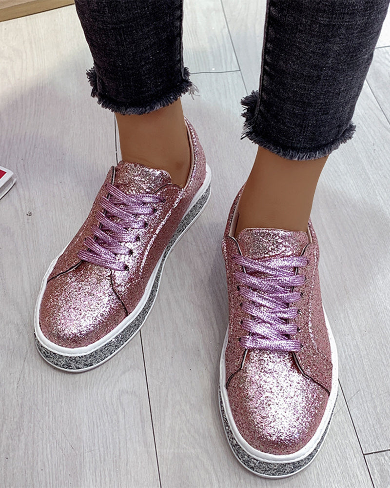Comfortable women's platform glitter sneakers. Effortless, chic casual footwear for trendy everyday wear.