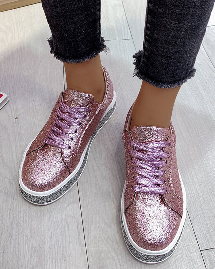 Comfortable women's platform glitter sneakers. Effortless, chic casual footwear for trendy everyday wear.