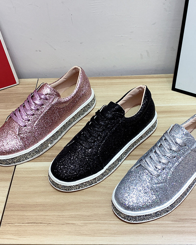 Women's dazzling glitter platform sneakers. Trendy casual footwear for a chic, comfortable and stylish look.