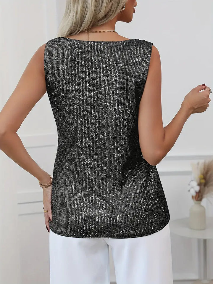 Chic sparkling V-neck top, ideal party wear for women seeking trendy elegance.