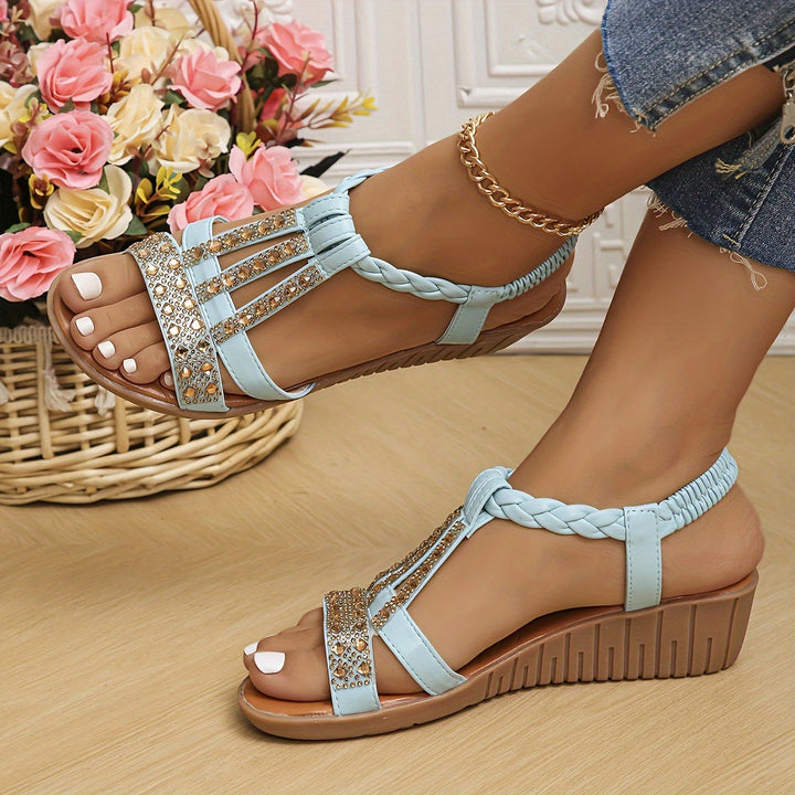 Rhinestone-embellished woven sandals for women, offering a dazzling sparkle.