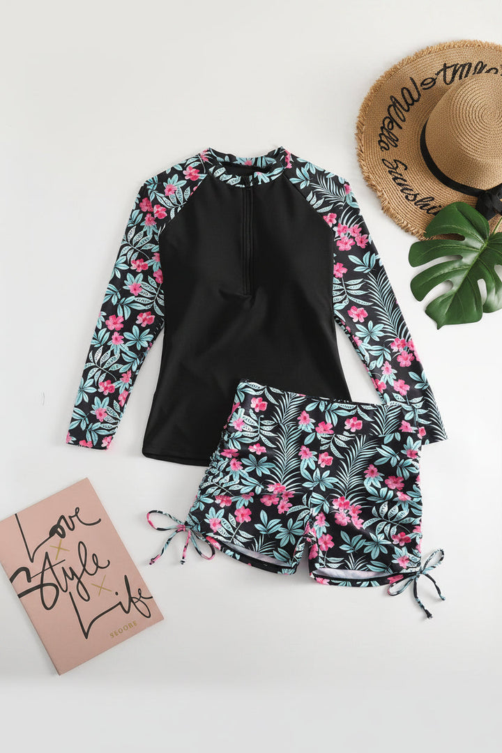 Women's sun protection rashguard swimsuit, tropical print two-piece with long sleeves & high-waisted fit.