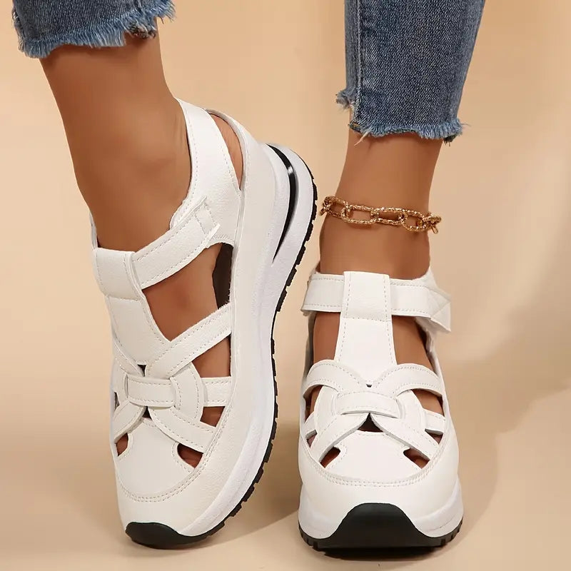 Women's sporty platform sandals with cutout straps & cushioned comfort. Perfect for summer walking.