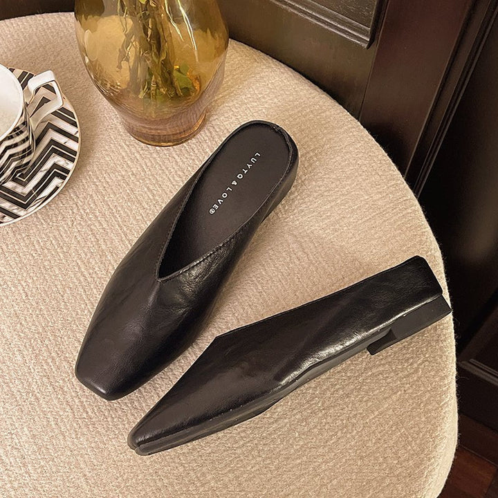 Elegant modern women's flats with a stylish square toe and comfortable slip-on design.