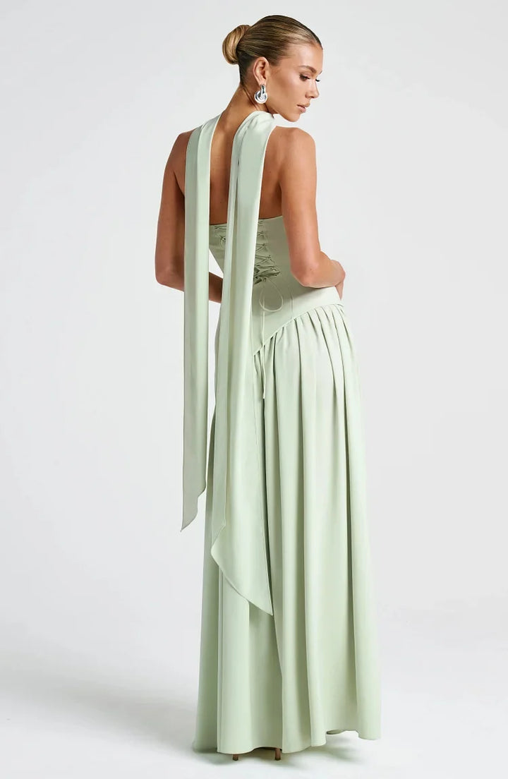 Sleek women's strapless maxi dress with a unique asymmetric hem design. Perfect elegant formal wear.