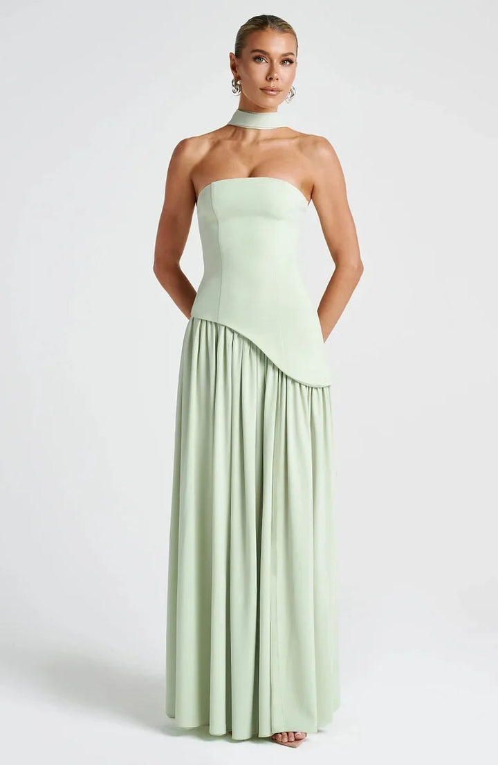 Stunning women's strapless asymmetric maxi dress. A chic, elegant option for formal evening wear.
