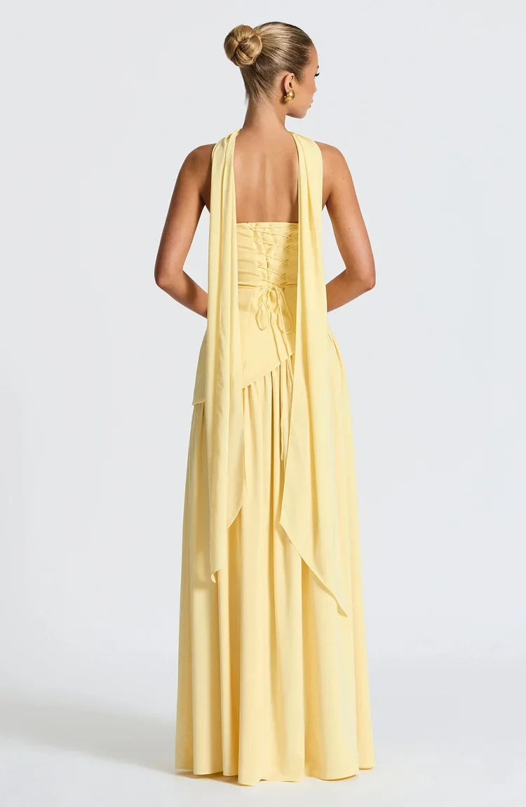 Sophisticated women's strapless asymmetric maxi dress for formal evening wear. Elegant and modern.