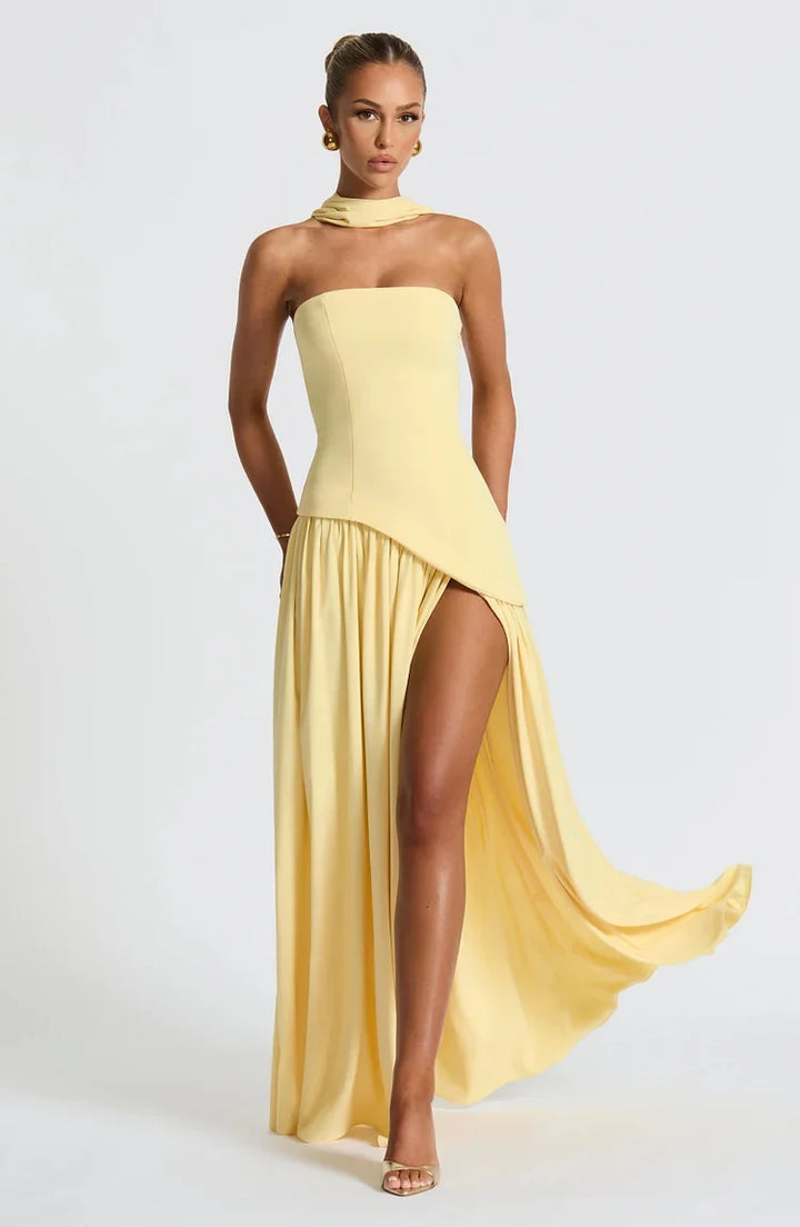 Beautiful women's strapless maxi dress with an asymmetric hem. Perfect for special occasion or formal events.