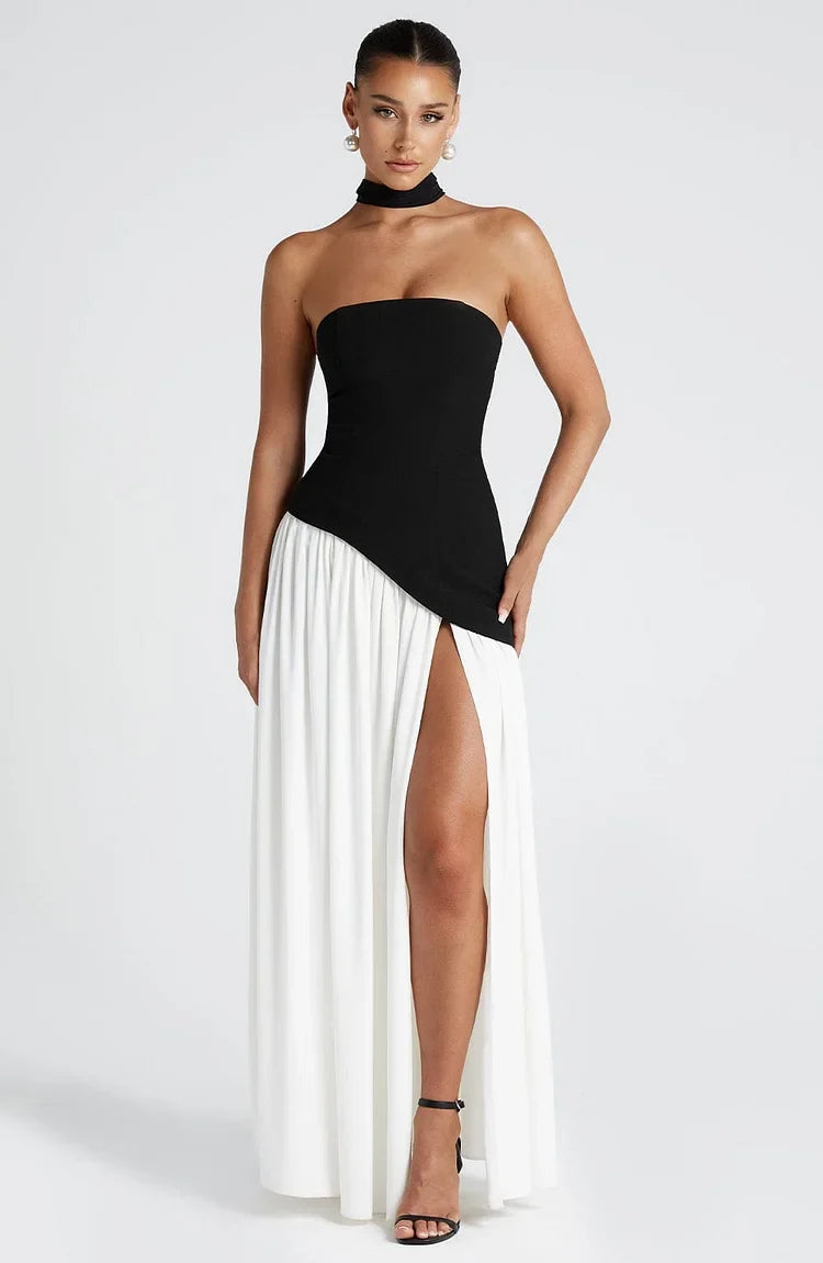 Elegant women's strapless maxi dress with a stylish asymmetric hem, perfect for evening events.