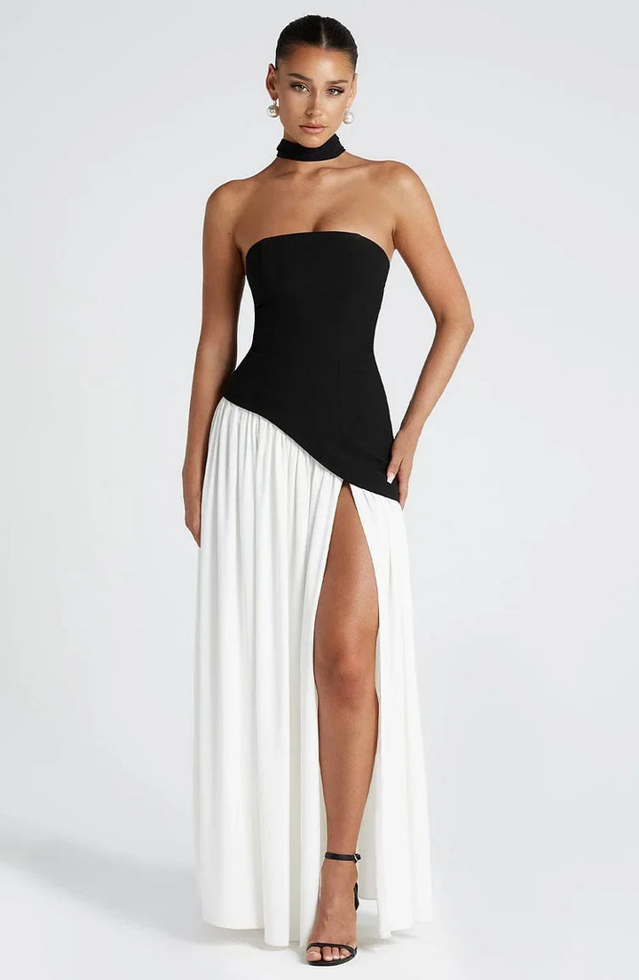 Elegant women's strapless maxi dress with a stylish asymmetric hem, perfect for evening events.