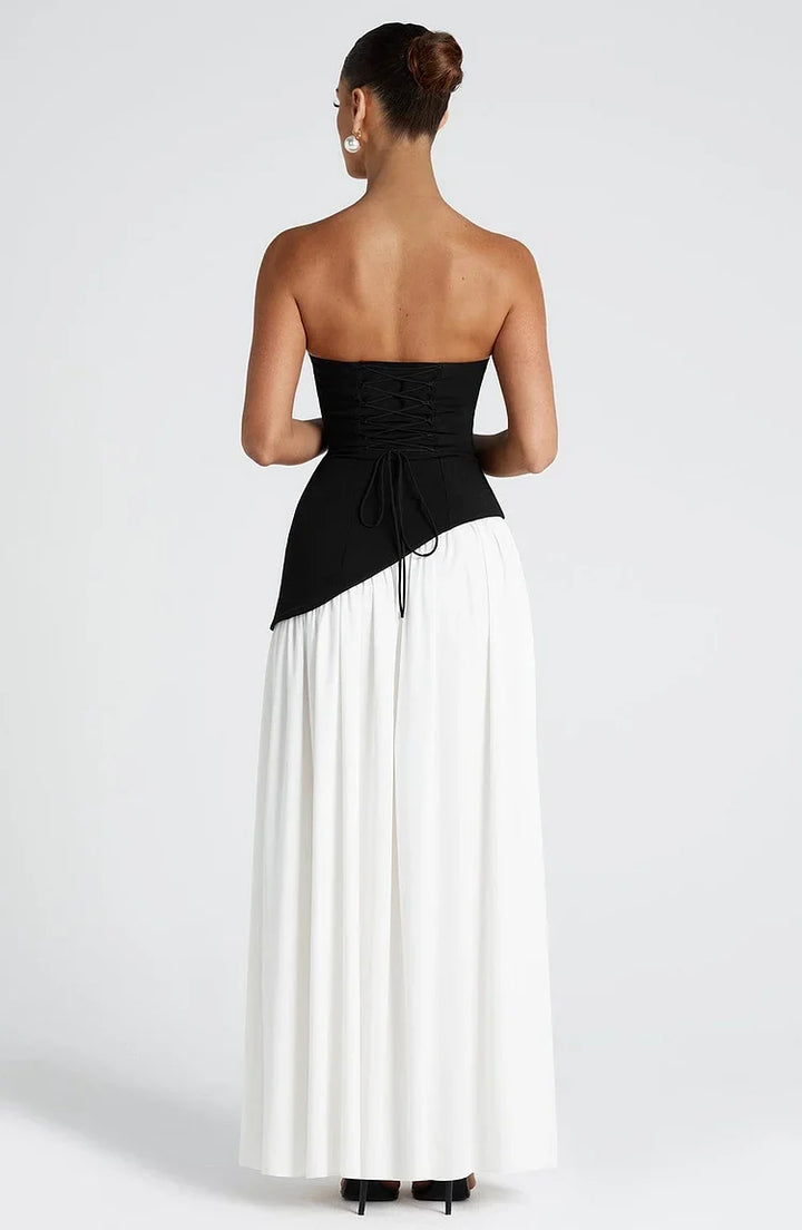 Formal strapless maxi dress for women, featuring an elegant asymmetric hem, ideal for cocktails.