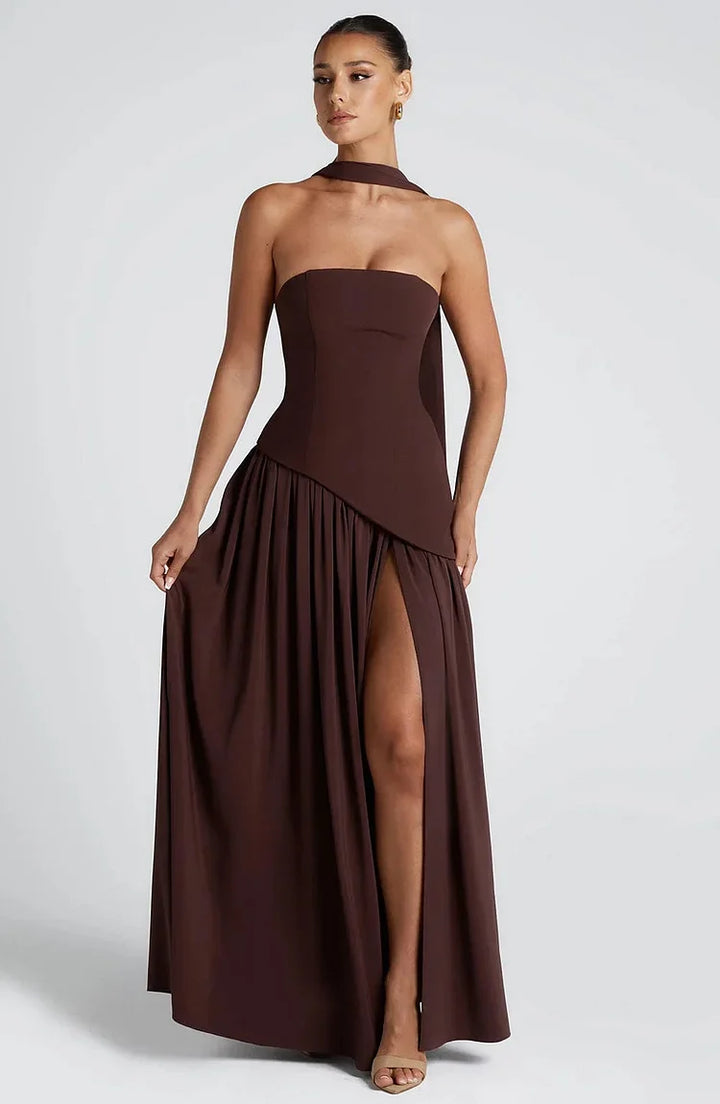 Long strapless maxi dress for women, featuring an elegant asymmetric hem. Ideal for formal events.
