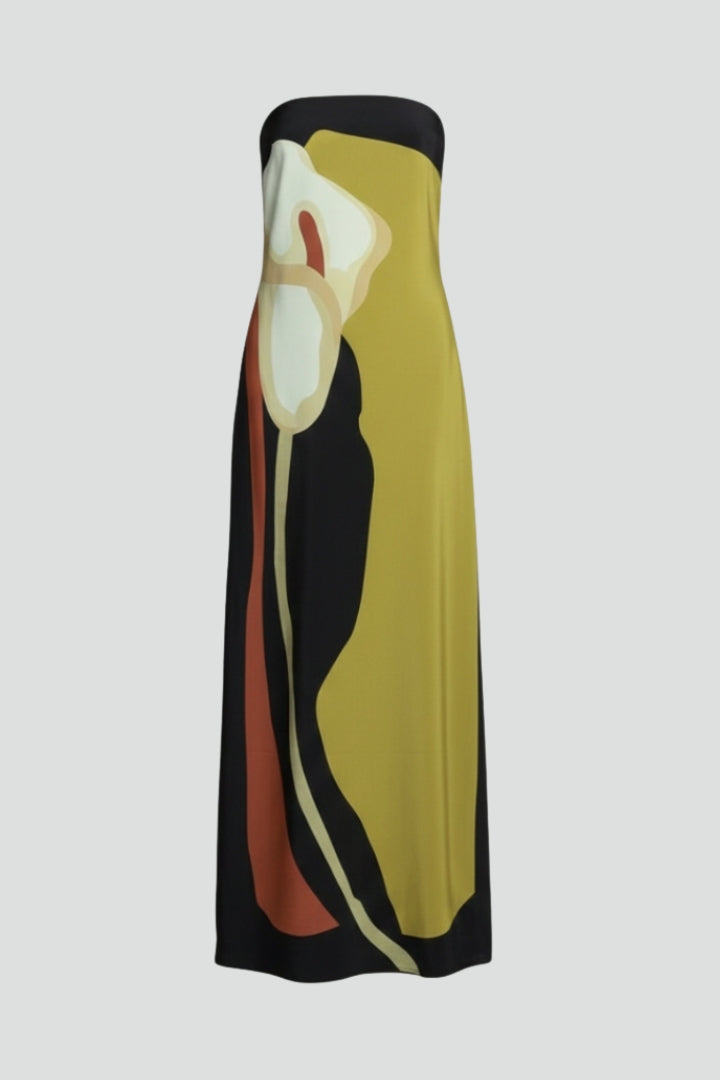 Women's strapless maxi dress with vibrant abstract pattern, perfect for summer beach or vacation.