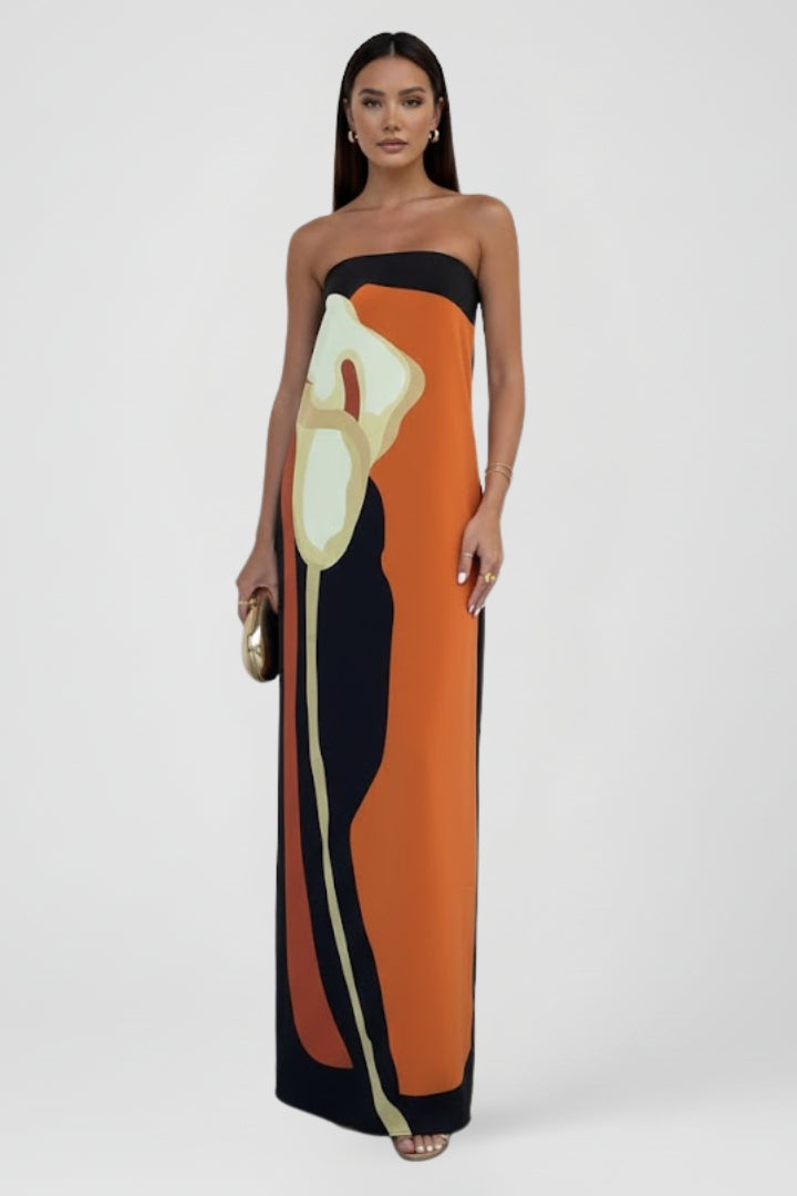 Vibrant abstract pattern strapless maxi dress for her, a comfortable and chic option for resort wear.