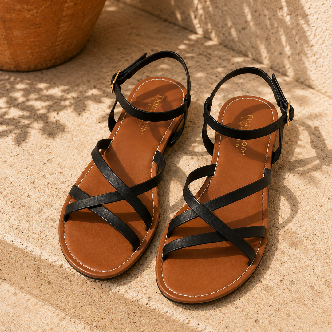 Stylish women's strappy flat sandals with an ankle strap, essential for everyday casual summer fashion.