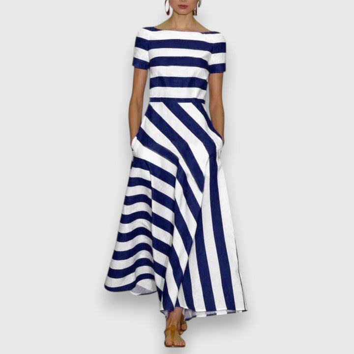 Women's striped bateau neck maxi dress with short sleeves & pockets. Perfect for summer, casual or elegant nautical style.