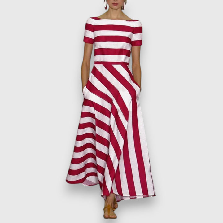 Elegant women's a-line striped maxi dress with bateau neck & pockets. Versatile for casual summer wear or dressier occasions.