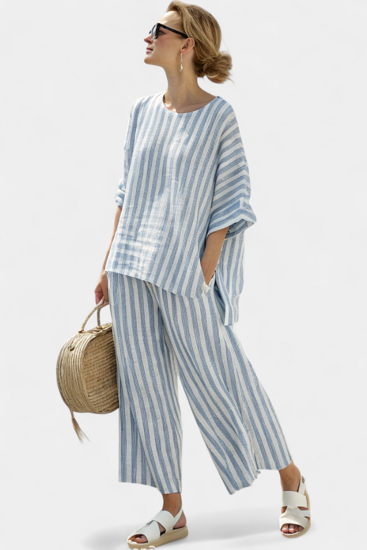 Effortlessly chic women's striped batwing top and wide leg pant set, a versatile casual two-piece outfit.