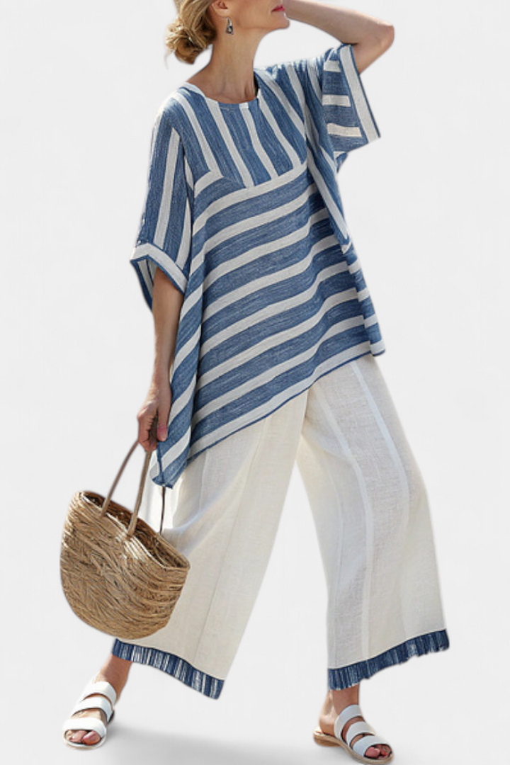 Women's striped batwing top & wide leg pant set with an asymmetric hem, perfect for casual chic summer fashion.