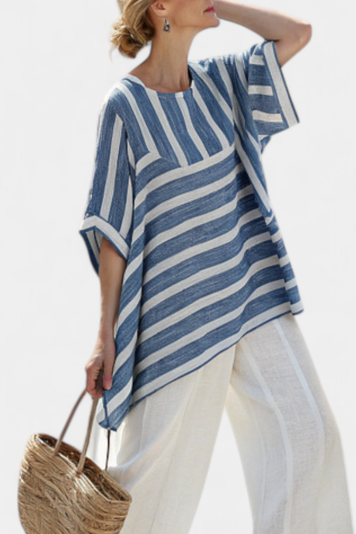 Elegant two-piece women's striped set with a relaxed fit batwing top & wide leg pants, ideal for resort wear.