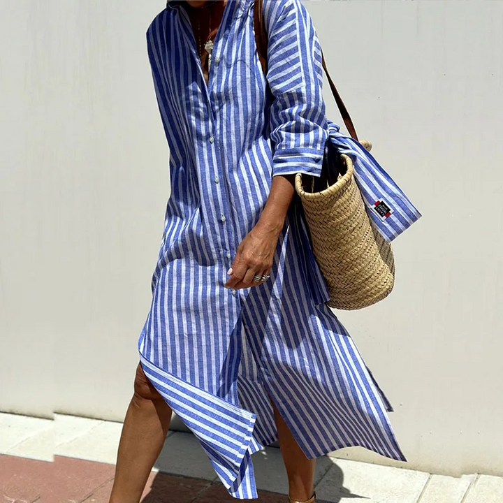 Elegant women's striped midi shirt dress with button-down front and three-quarter sleeves, versatile summer fashion.