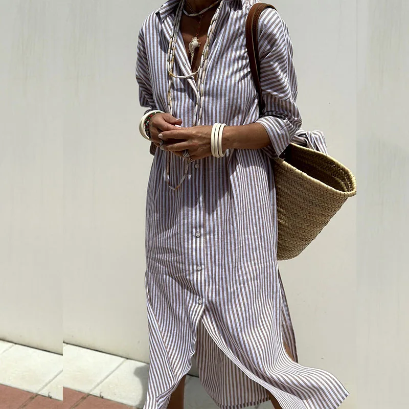 Casual women's striped midi shirt dress, button-down front, three-quarter sleeves, ideal for effortless summer style.
