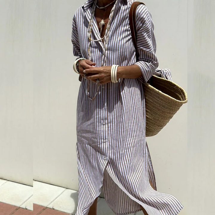 Casual women's striped midi shirt dress, button-down front, three-quarter sleeves, ideal for effortless summer style.