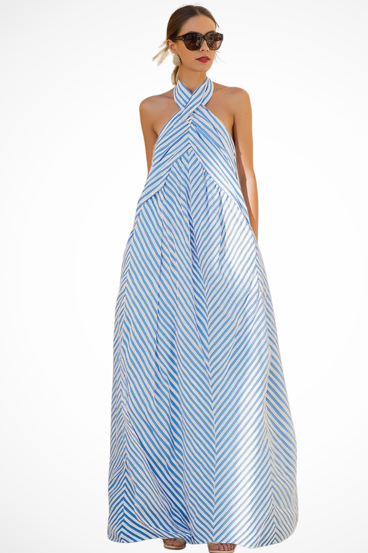Elegant women's striped halter neck sundress, a sleeveless A-line maxi dress for warm weather.