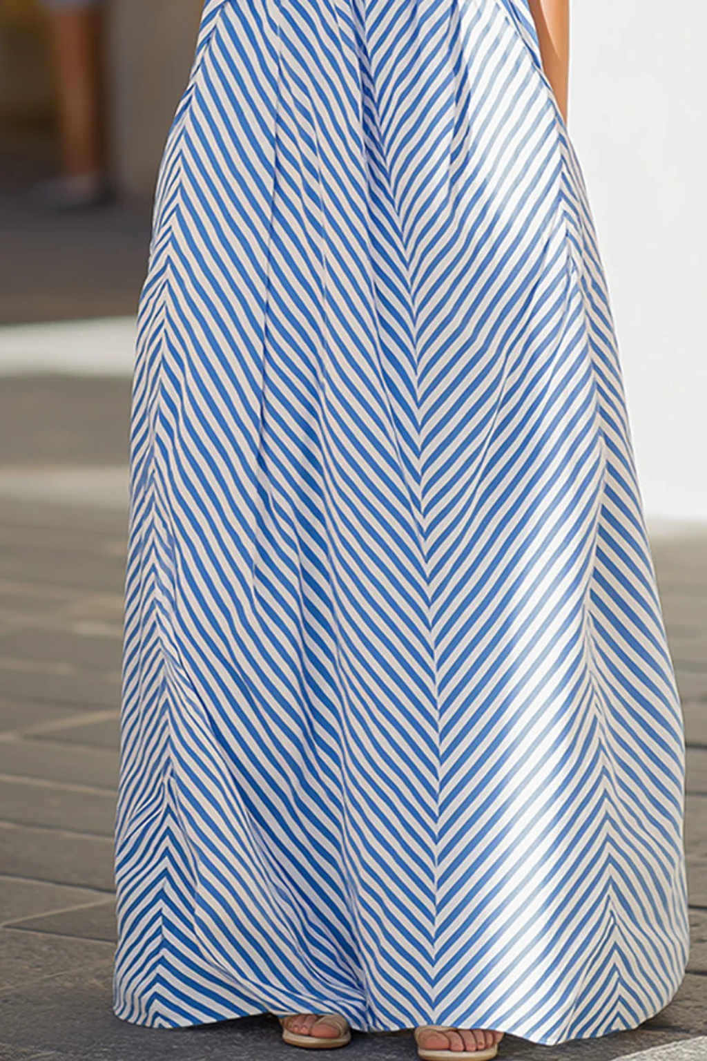 Chic women's striped A-line maxi dress with a stylish halter neck, great for summer and vacation.