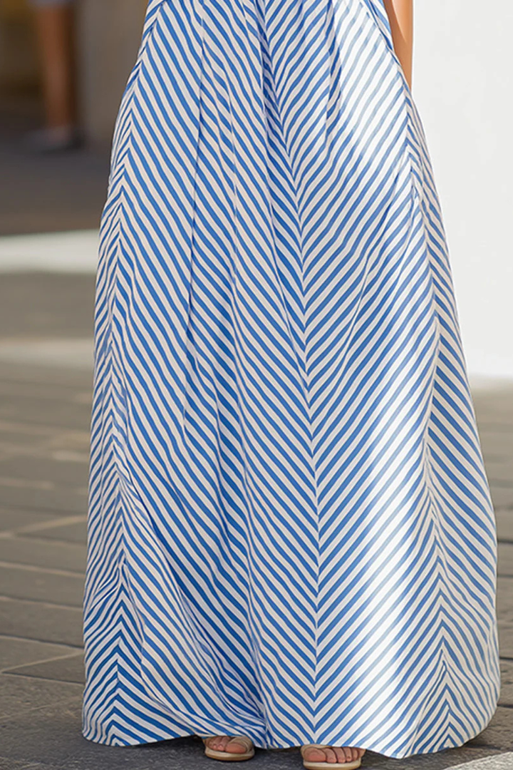 Chic women's striped A-line maxi dress with a stylish halter neck, great for summer and vacation.