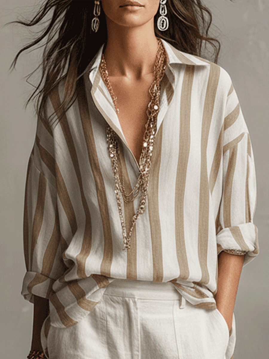 Stylish women's striped top featuring a button front and long sleeves for a versatile, relaxed fit look.