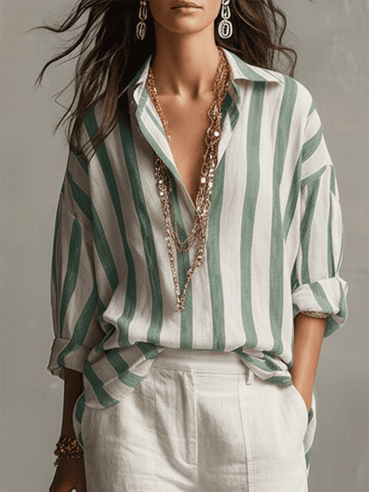Casual women's button-front blouse with classic stripes and long sleeves, ideal for everyday wear.