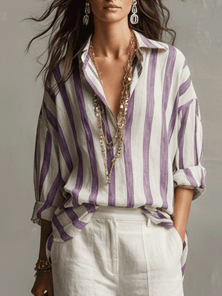 Effortless style: women's striped long sleeve blouse, button front, offering a comfortable, relaxed fit.