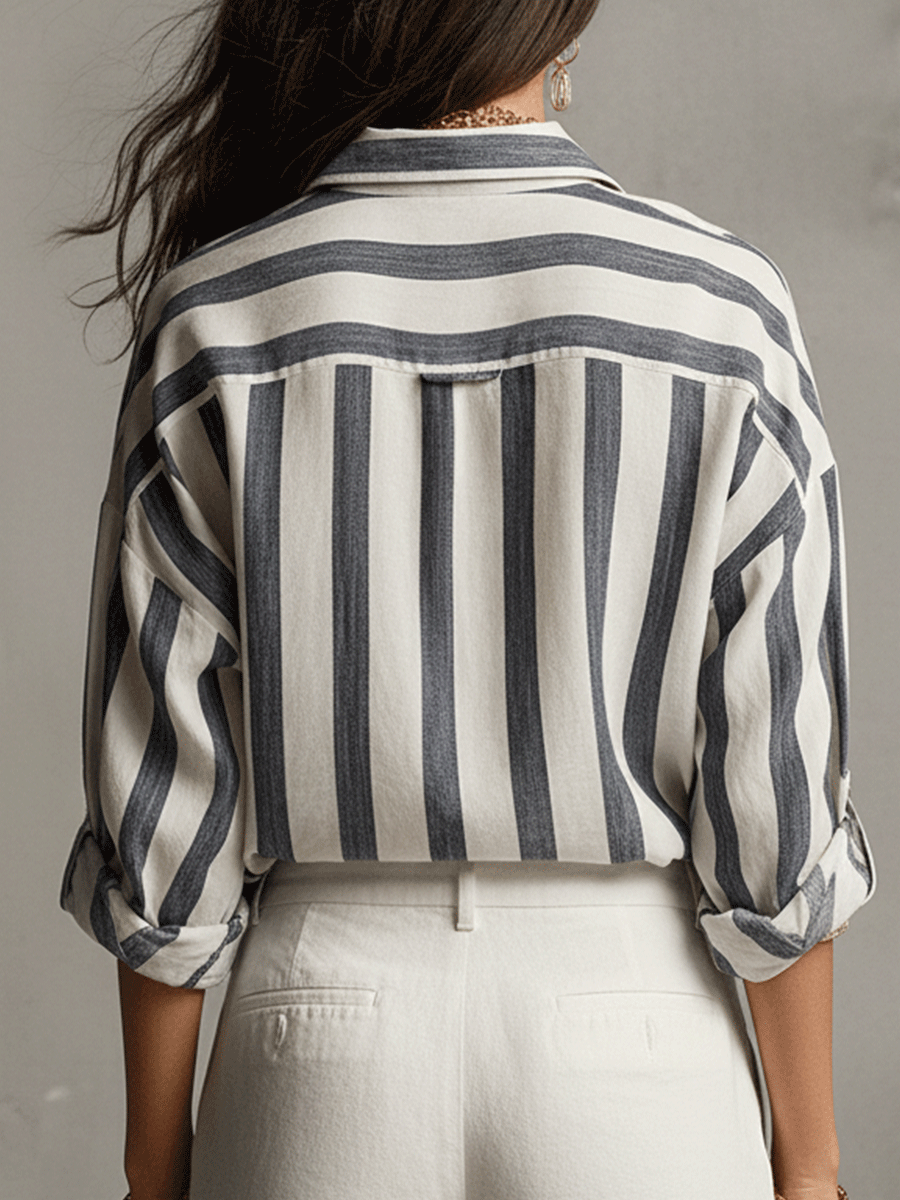 Front view of a women's striped long sleeve blouse, buttoned down, showcasing its elegant casual appeal.