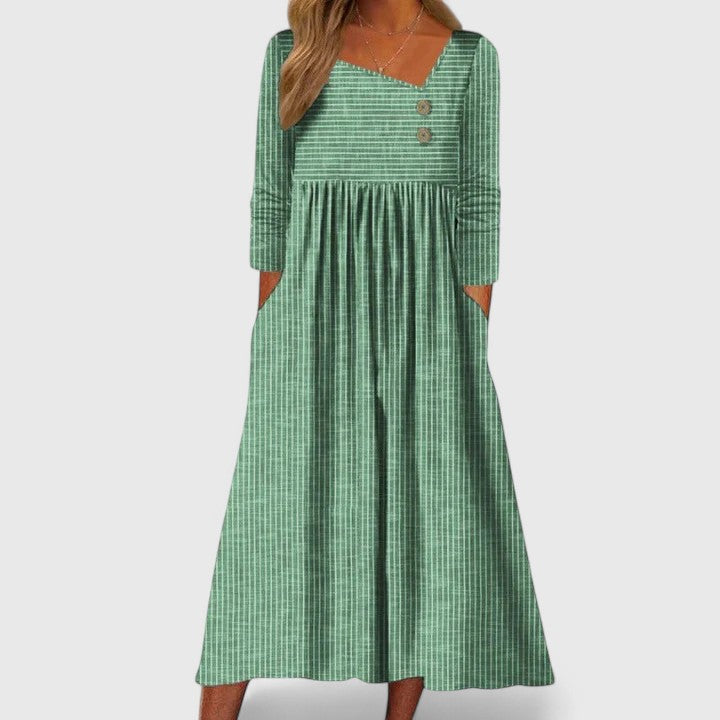 Comfortable women's striped midi dress, long sleeves, button detail & pockets, great for spring and fall outfits.