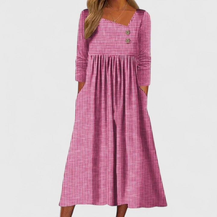 Full view of women's striped long sleeve midi dress, featuring button placket & comfortable A-line silhouette.
